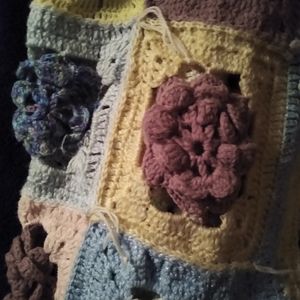 Hand made crocheted rose baby blanket